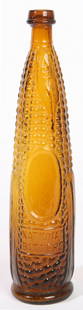 AMBER NATIONAL BITTERS EAR OF CORN BOTTLE: With embossed name on side and "Patent 1867" on bottom. Fine condition. 12 1/2" h.