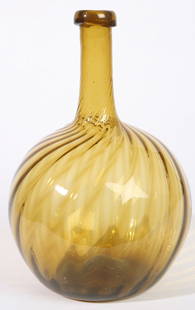 EARLY LARGE AMBER RIBBED BOTTLE: Twenty-two ribs. Good condition. 15" h. x 10" w.