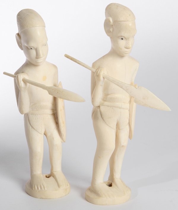 PR. OF CARVED IVORY MASAI WARRIORS: Each holding shield and spear, with attached typed note reading, "A Pair of African Tribal Carvings, Ivory Collected in 1964 by Medical Missionary S.E. Wallace in East Africa". Age line in one, otherw