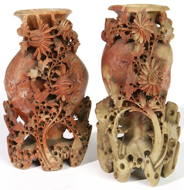 PR. CHINESE CARVED SOAPSTONE URNS: With branching flowers, and urn bodies etched with more flowers; circa 1900. 9 1/4" h. in multi-colored soapstone. Very good condition.