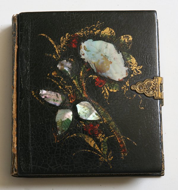 DAGUERREOTYPE PORTRAIT OF GEO. E. CURRIER, SHIP BUILDER: Sixth plate image mounted in book from case with M.O.P. decorated cover and gilt fore-edges, entitled on spine “Friendships Offering”. This is a very clean and clear image with original seals of a