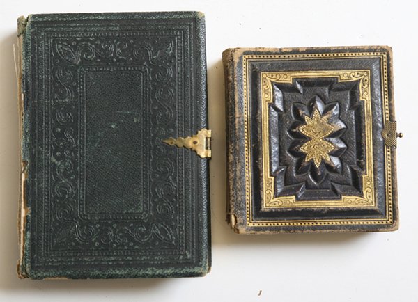 TWO VICTORIAN PHOTO ALBUMS: Including an album of Gem Tintype photos, book form and somewhat unusual in that there are two full length portraits, rarely found in this size image, also a few double portraits, 77 images in all in 
