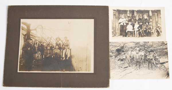 EARLY PHOTOS OF HUNTERS & MINERS: Lot of 3 including two real photo post cards, one showing group of coon hunters, both men and women with two coon hounds, shot guns and pelts on the barn wall behind; 2nd shows a group of 10 tired and