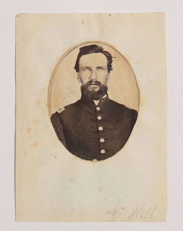 ID'D CIVIL WAR ALBUMEN PHOTO W. HILL 81ST. O.V.I.: An officer, oval 1.5” x 2” mounted on cdv sized card stock and inscribed in period pencil along lower margin “W. Hill”. This is almost certainly William H. Hill, who enlisted as a Caption on J