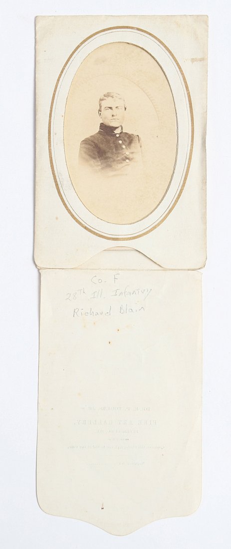 CIVIL WAR ALBUMEN CDV PRIVATE RICHARD BLAIN 28TH ILL.: A half-length portrait of a young Richard Blain wearing a nine button frock jacket, stamped on reverse with “Dr. E.P. Rogers Jr./Surgeon/Dentist/Petersburg, Ill.” in original mailing paper sleeve 