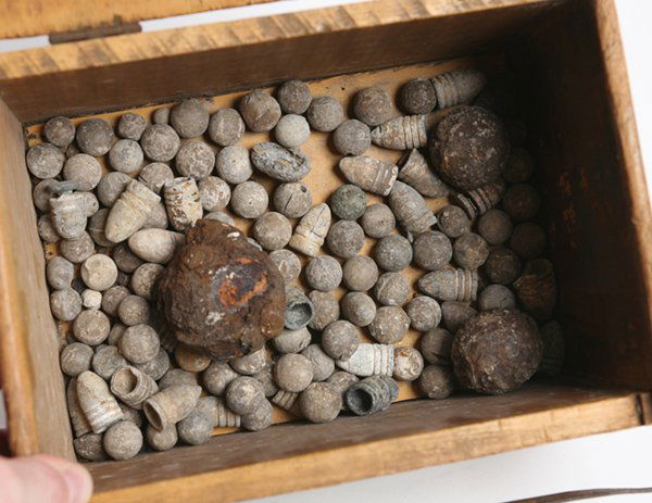 LG. GROUP OF CIVIL WAR MINI-BALLS, BULLETS PLUS: Lot of ???, includes 3 iron canister shells, 1.5” & 2” plus 30 lead rifle slugs, all but one spent, plus circa 100 rifle and pistol round shot, plus one 32 caliber pistol shell all in a wooden dov