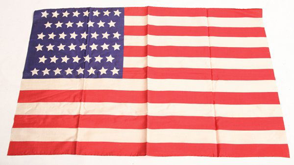 46 STAR SILK PARADE FLAG: With canton pattern of 8-7-8-8-7-8, 15” x 24”.