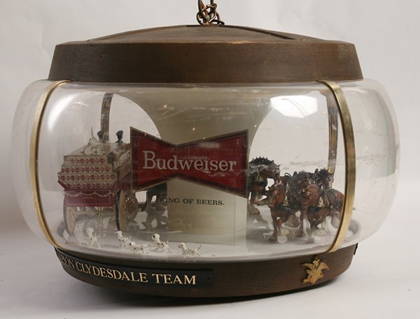 LARGE ROTATING BUDWEISER LIGHTED HANGING SIGN: With the Clydesdale team pulling wagon of beer followed by dalmation dogs, 15” high x 22” diameter.