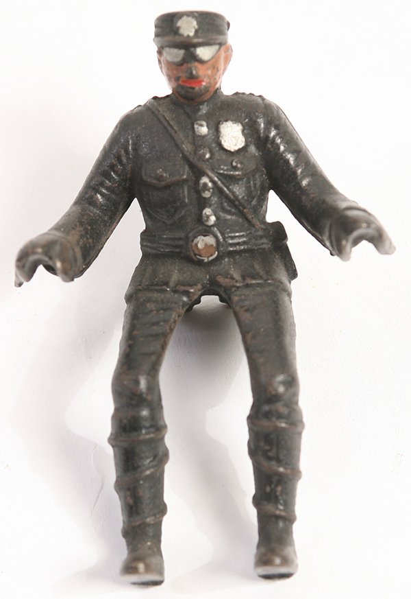 CAST IRON MOTORCYCLE POLICEMAN: Rider only no bike, in original painted finish, 5” high.