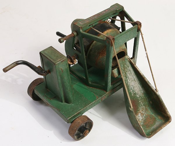 BUDDY L CONCRETE MIXER: Heavy gage pressed steel in original green paint and decals with cast iron wheels, 7” x 8.5” x 7.75” high.