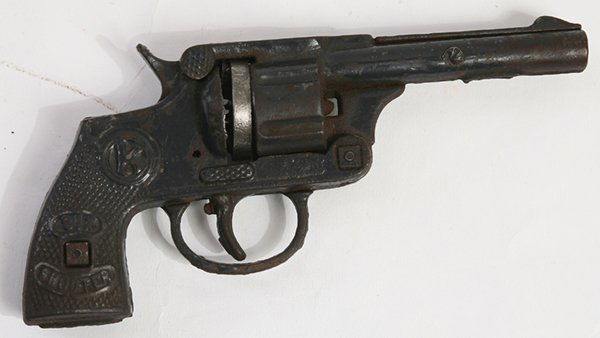 KILGORE CAST IRON SIX SHOOTER CAP GUN: In original black painted finish, 6.5” long.