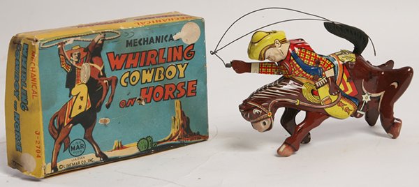 LINEMAR LITHOGRAPHED TIN WHIRLING COWBOY ON HORSE IN BO: In original chromolithographed paint finish, marked “Line Mar Toys” in circle, spring driven movement, 6” high, with original chromolithographed card stock illustrated box, 4” x 6” x 2” hi