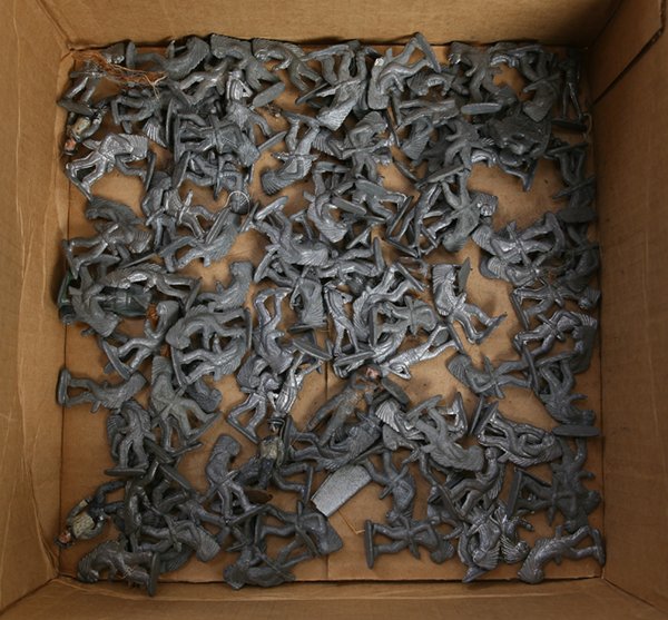 124 TOY LEAD INDIANS & OTHERS: Includes the following never painted pieces: 105 Indians, 1.75” high; plus eleven 1.7” high marching WWI soldiers; plus one WWI cannon; plus race car from early Monopoly game; and 6 soldiers and s