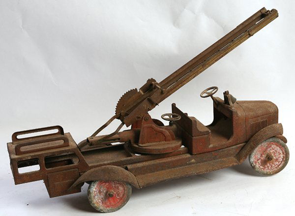 BUDDY L LADDER FIRE TRUCK: Pressed steel Buddy L fire truck. In as found condition. 30" long.