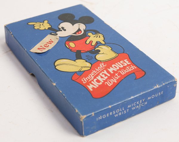 BOXED INGERSOLL MICKEY MOUSE WRIST WATCH: With original chromed strap with figures of Mickey, illustrated dial, marked “Mickey Mouse Ingersoll with false second hand dial below center with movement marked Ingersoll Watch Co. Made in U.S.A.