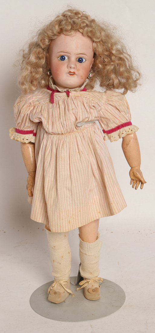 J.B. FRENCH BISQUE BEBE DOLL: Socket head marked on back of head “France J.B. 6” either Jacques Berner or J. Balleroy, circa 1890, with fixed blue glass paperweight eyes, open mouth, pierced ears on jointed composition body wi
