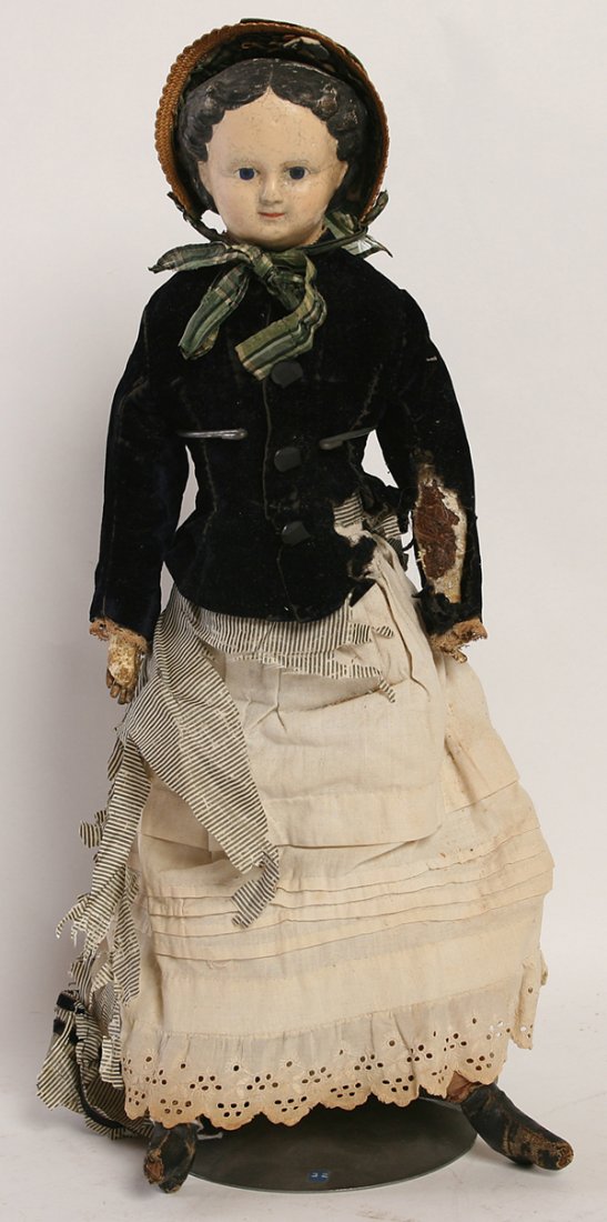 GREINER PAPER-MACHE SHOULDER HEAD DOLL: On kid body in original outfit, with straw bonnet, oilcloth body with kid lower arms, 20” tall.