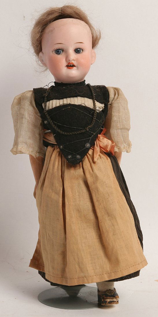 A.M. 390 GERMAN PEASANT BISQUE DOLL: Socket head marked on back of head “Made in Germany Armand Marseille 390 D.R.G.M. A.6/0 M.” with sleep blue glass eyes, open mouth, original red wig, on 5 piece composition body and dressed in ori