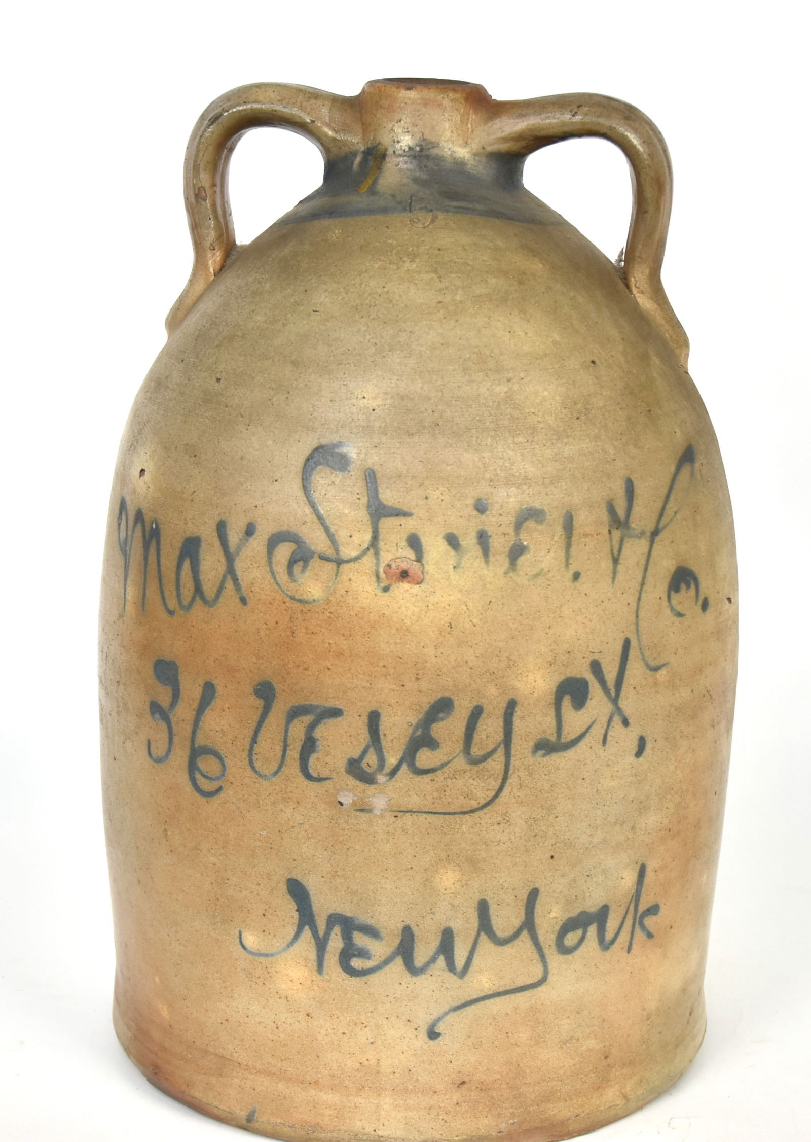 Double Handled Decorated Max Stiner New York Stoneware Jug: Salt glaze with Albany glazed interior with applied C scroll handles, neck to shoulder, straight sided stamped 5 on shoulder with painted cobalt ring just under neck and painted cobalt Max Stiner & Co