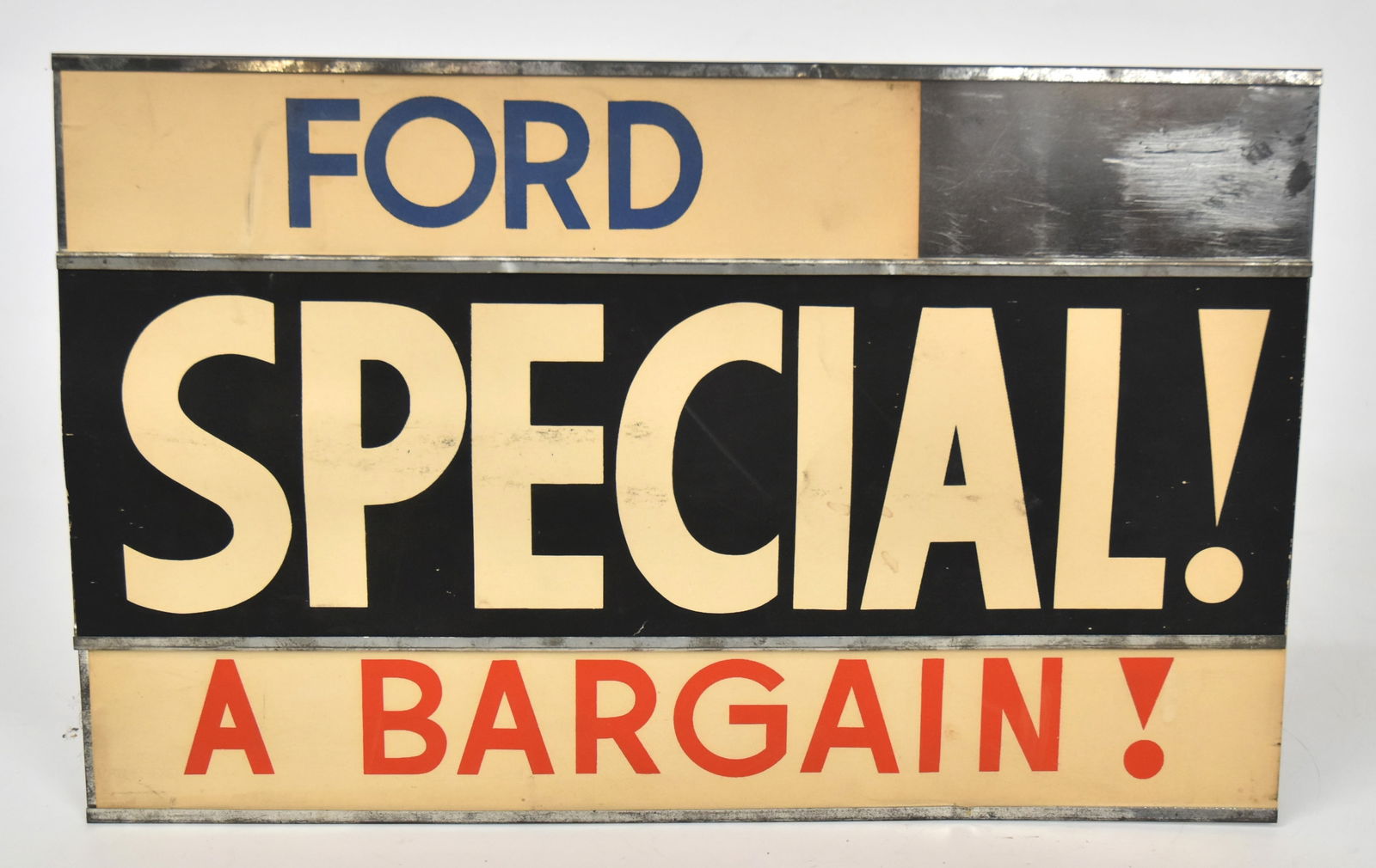 1940's Ford Car Window Sign: Metal and paper. 9 1/2" x 15". Good condition.