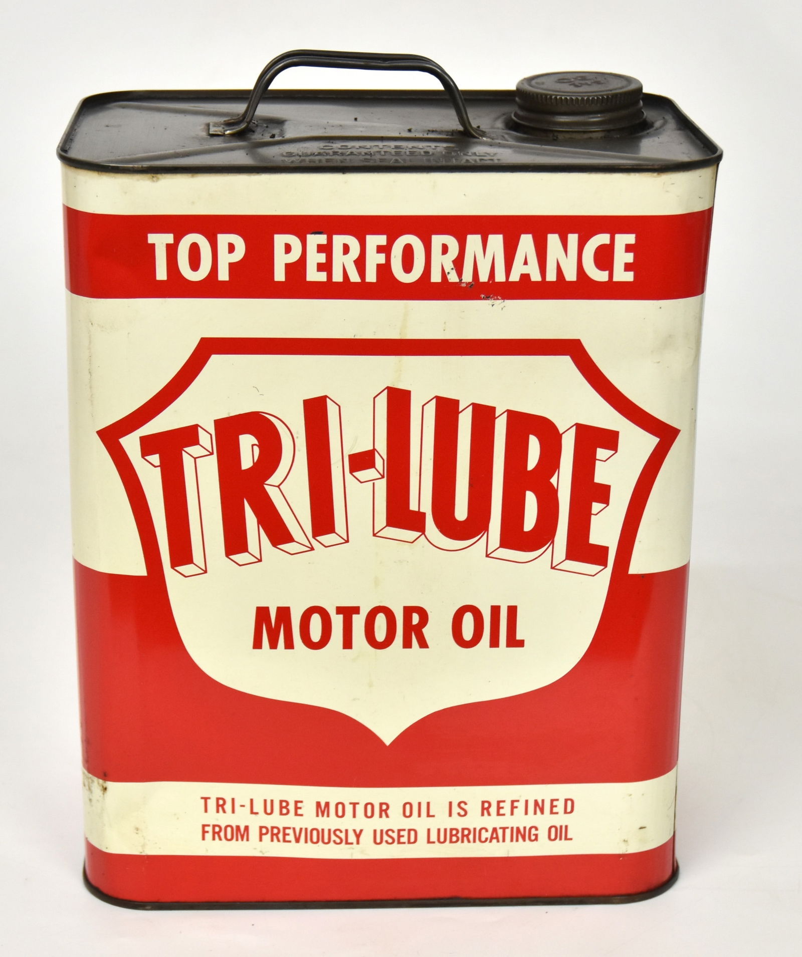 Tri-Lube Two Gallon Motor Oil Can: 12"H x 8 1/2"W x 5 1/2"D. Good condition.