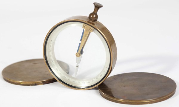 BRASS W. & L.E. GURLEY COMPASS: 4" diameter marked as above and "Troy N.Y. with two removable lids and silvered dial.