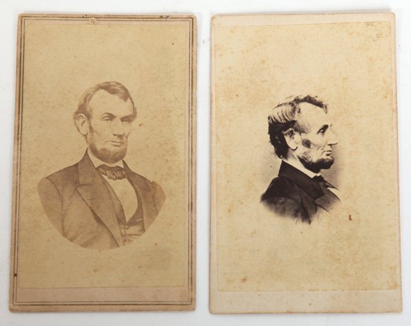 TWO ALBUMEN CDV'S OF LINCOLN: Includes a fine five dollar bill portrait with back mark of Wm. A. Morrow, Hillsboro, Ohio; and a half length portrait with back mark of W. Winder & Co., Cincinnati.