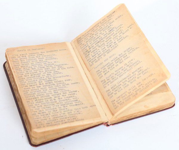 WWI DIARY OF PVT. CHAS. A. SCHULDT A.E.F., 34TH ENGINEE: A 66pp diary in brown cloth broads (4.75” x 7.25”) both Ms. ink and typed headed Pvt Chas. A. Schuldt, Jr. Co G, 34th Engrs., A.P.O. 712. A.E.F. Nearly all the pages have laid in typed poems about