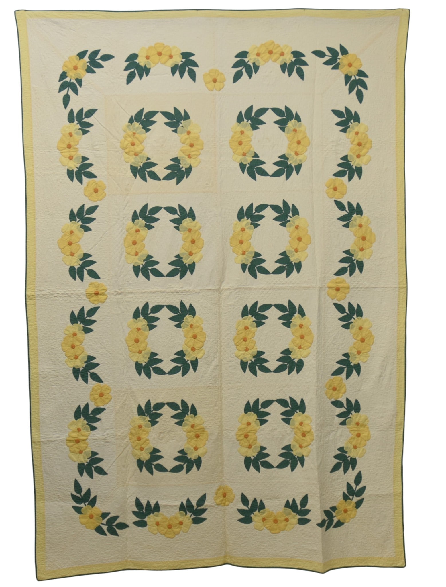 Fine Appliquéd Quilt: Floral wreaths repeating, circa 1900-20, all hand quilted, 93 X 64". Condition VG+.