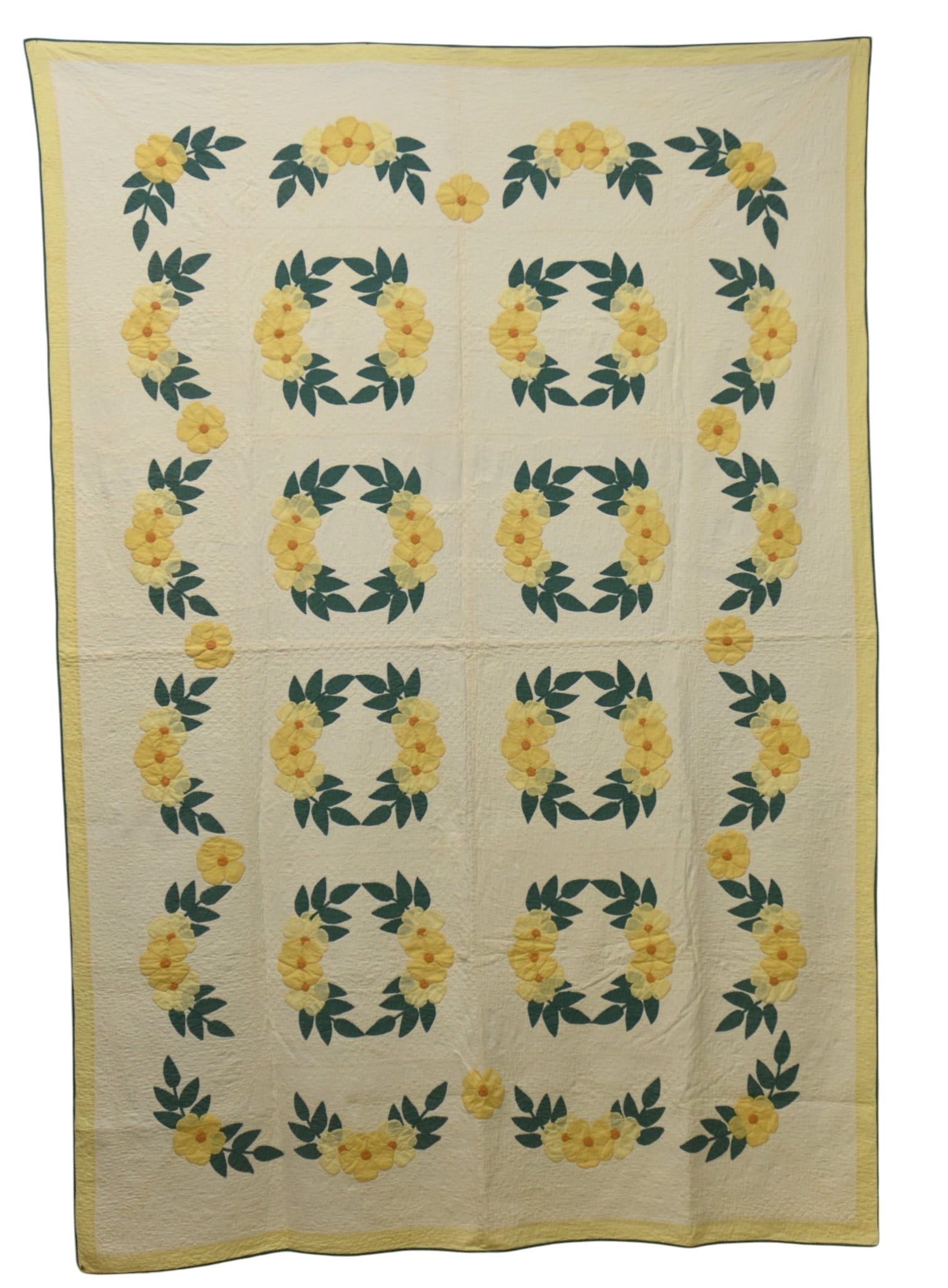 Fine Appliquéd Quilt: Floral wreaths repeating, circa 1900-20, all hand quilted, 93 X 64". Condition VG+.