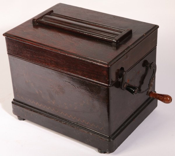 WALNUT ROLLER ORGAN: Plays paper rolls. 10" high x 12" wide x 9" deep.