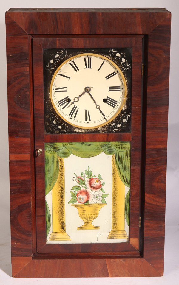 CHAUNCEY JEROME OGEE CLOCK: In mahogany with original varnish finish, original painted vase of roses in lower tablet and painted surround in upper, replaced painted tin dial, brass time & strike weight driven movement, with orig