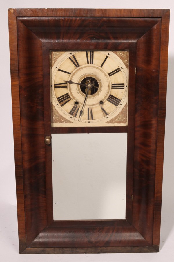 SMITH'S N.Y. OGEE CLOCK: In mahogany case with mirrored lower tablet, painted wood dial, with open escapement, brass time & strike weight driven movement and original printed illustrated paper label on interior reading in par