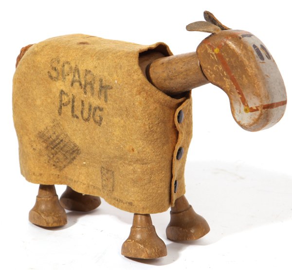 SCHOENHUT SPARK PLUG: In original painted finish with original felt blanket marked “Spark Plug”, with 3 snap closure at front, original leather ears, original braided hemp tail, 10 x 7.5” high.