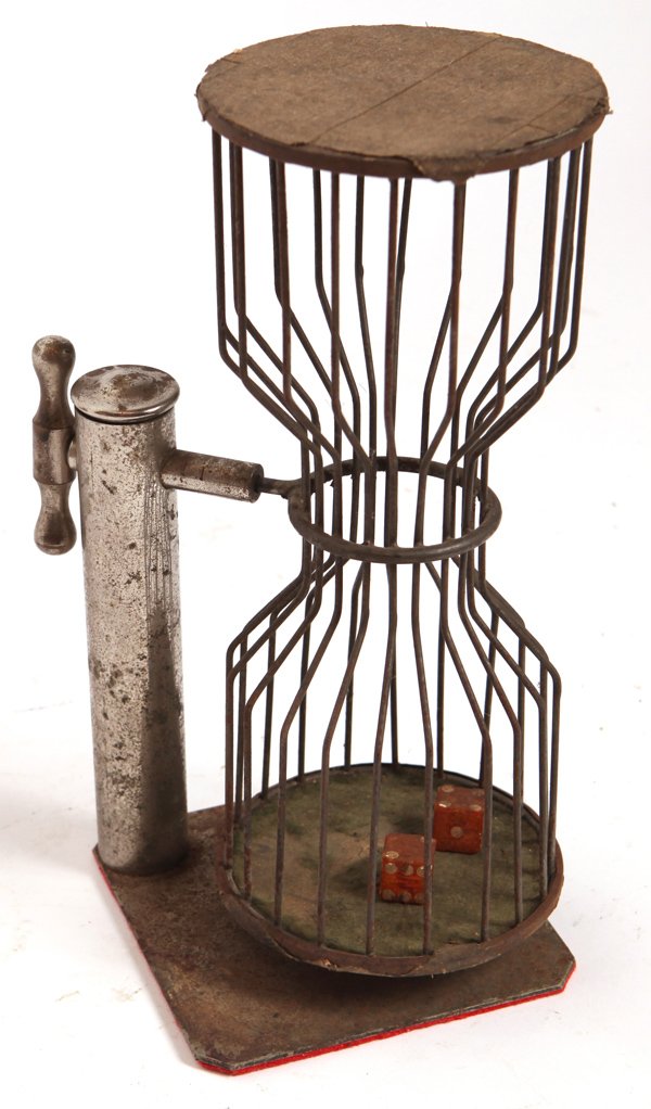 CIRCA 1900 GAMBLING DICE GAME: Nickel plated with original dice. 11 3/4" high.