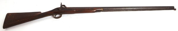 EARLY PERCUSSION FOWLER: Likely European with 4 different marks on left side of 32” round barrel with nice engraved sunburst on top of barrel, floral scroll engraved lock plate, nice walnut stock and forearm, both with fine