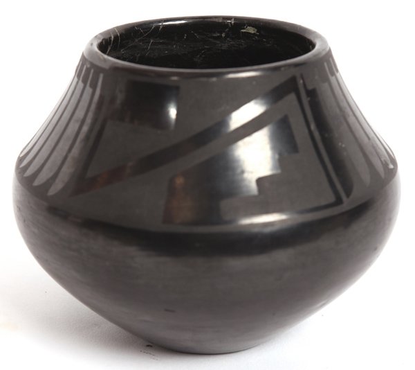 MARIA & SANTANA SAN ILDEFONSO VASE: Black on black with feather and stepped design, signed on base as above 6” diameter x 5” high.