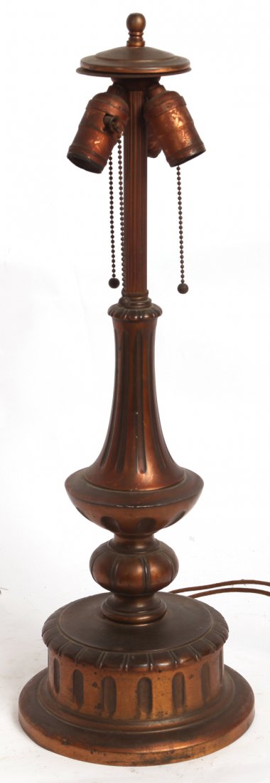 PAIRPOINT LAMP BASE: With three light sockets, fluted column with melon form below fluted urn and stepped round base marked “Pairpoint”, 23.75”high, with cap and finial.