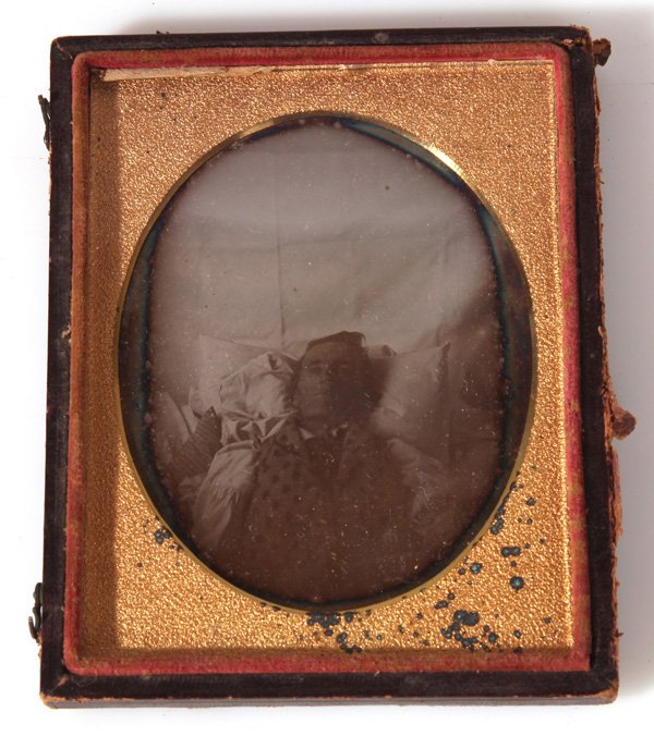 PLATE DAGUERREOTYPE POST-MORTEM PHOTO OF GENTLEMAN: Anonymous quarter plate housed in a half case, circa 1850, a nice clean image of a middle aged man in white shirt and printed vest, plate stamped with makers name and N.Y. Original seals behind image.