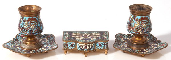 FRENCH BRONZE CHAMPLEVE DESK SET: Three pieces including a pair of candlesticks with lotus form drip pans and a stamp box, sticks are 4 x 3.5”high, box is 3.5 x 2.25 x 1.35”high.