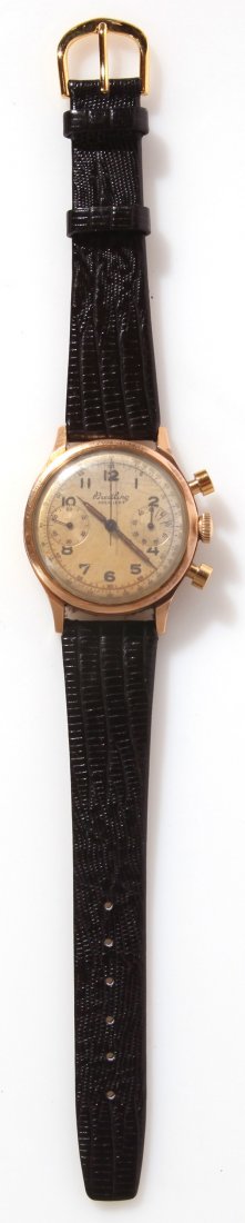 BREITLING PREMIER CHRONOGRAPH GOLD WRIST WATCH: In solid 18k yellow gold waterproof case. Nice patinaed original dial and hands, manual wind Valjoux 23 movement.