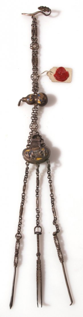 ENAMELED CHINESE SILVER OPIUM CHATELAINE: With three attached tools and belt hook, three parts with enamel decoration, circa 1860, 15”long, 3.10 troy ozt. This piece has with attached paper tag with red wax seal from department of Antiquiti