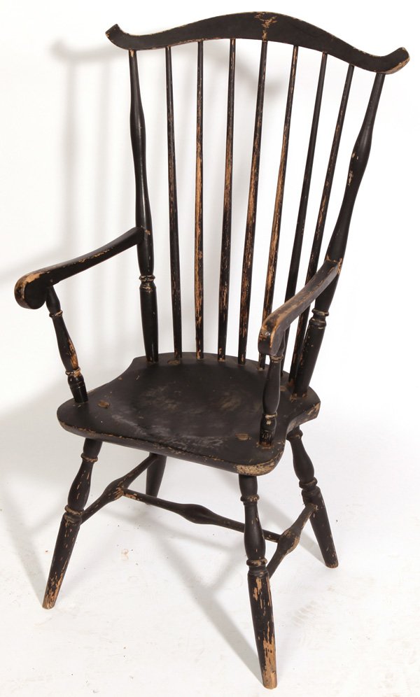 NANTUCKET WINDSOR ARM CHAIR: With yoke style crest with ears, nice shaped saddle seat, scrolled arms, and Queen Anne type turned legs with bulbous stretcher, in period black painted finish, circa 1810, 17”deep x 25.5”wide x 4