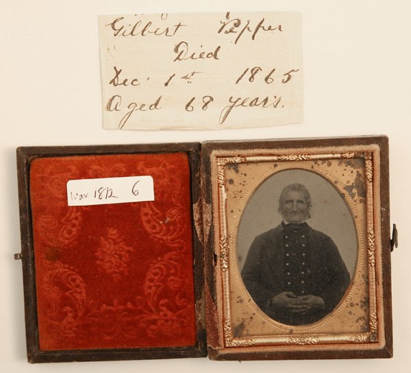 AMBROTYPE PHOTO OF WAR OF 1812 VETERAN: A ninth plate cased ambrotype portrait of an elderly gentleman in his War of 1812 uniform, identified in period ink on attached slip of paper reading “Gilbert Pepper Died Dec. 1st 1865 Aged 68 years