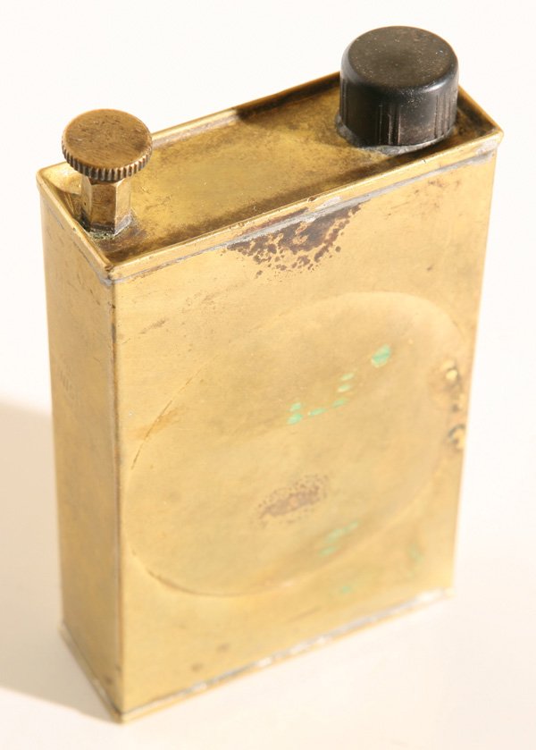 WWII ARMY AIR CORPS MACHINE GUN OILER: This is a US Army Air Corps machine gun oiler, is brass with Bakelite black cap on one end, metal screw cap on the other side. Manufactured by the Mirax Chemical Product corporation. Marked “Air Cor