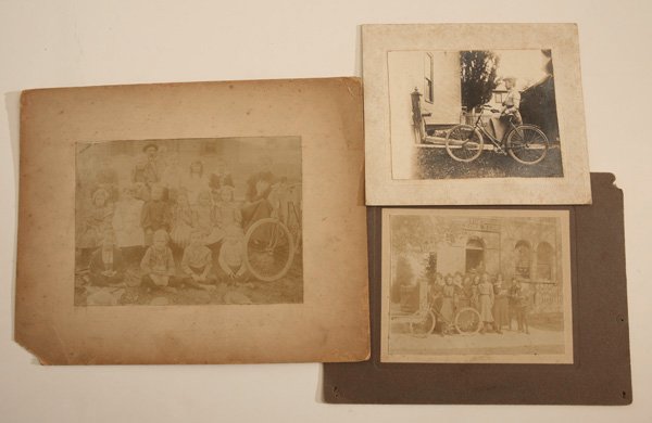EARLY BICYCLING PHOTOGRAPHS: Lot of 3 including a 4.75 x 6.5” circa 1890 photo of family with mother standing beside her bike, on larger card stock; plus a 4 x 5” circa 1910 silver print of young woman and her bike; and a 3.7