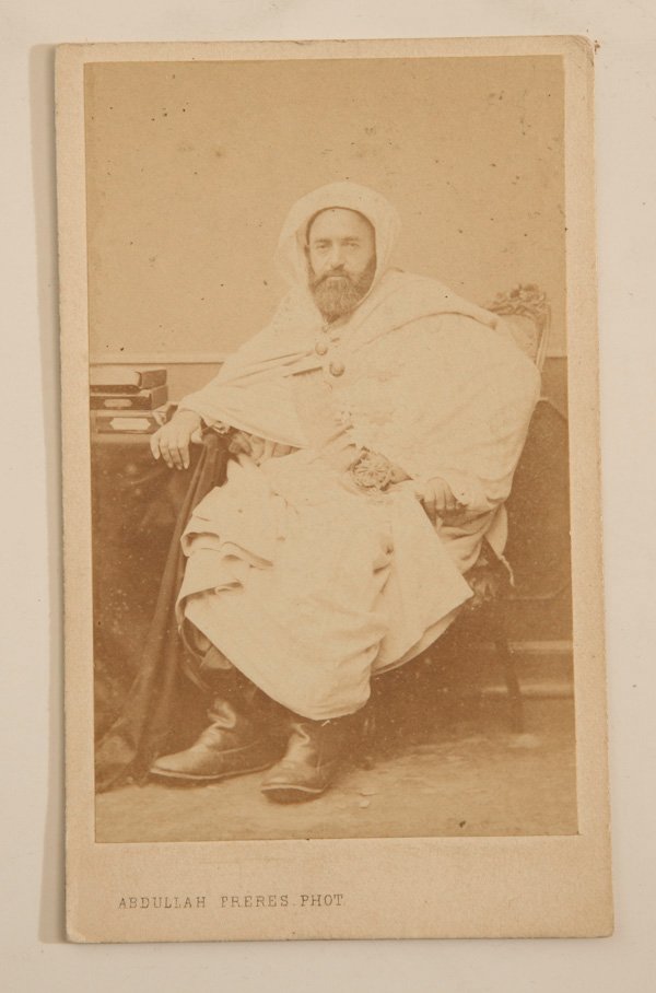 ALBUMEN CDV OF OTTOMAN TURK: In flowing white robes with massive belt and heavy leather boots, imprint of Abdullah Freres, Pera Constantinople.