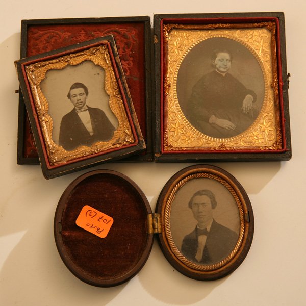 THREE CASED PHOTOGRAPHS: Including 9th plate ambrotype of a decidedly Asian looking gentleman identified in period pencil on reverse as “Geo. W. March” with imprint of “S. Shattuck, Lowell”, Mass., mounted in half cas