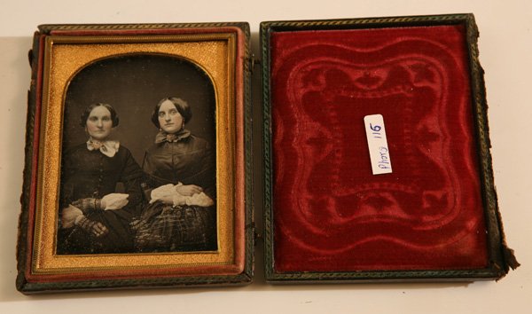 FINE QUARTER PLATE DAGUERREOTYPE DOUBLE PORTRAIT: Of two ladies identified on enclosed slip of paper as “Francis Smith/Helen J. Stephenson”. This sharp and clear dag is hand tinted and mounted in a full case. Helen is listed under her middle name