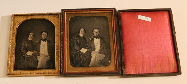 2 QUARTER PLATE DAGUERREOTYPES OF STEPHENSON'S: Both taken during the same seating. Helen I. & Mr. John L. Stephenson, from Elmira, N.Y. area identified on slip of paper reading “Mr. & Mrs. J.L. Stephenson”, with nice hand tinting and her jewel